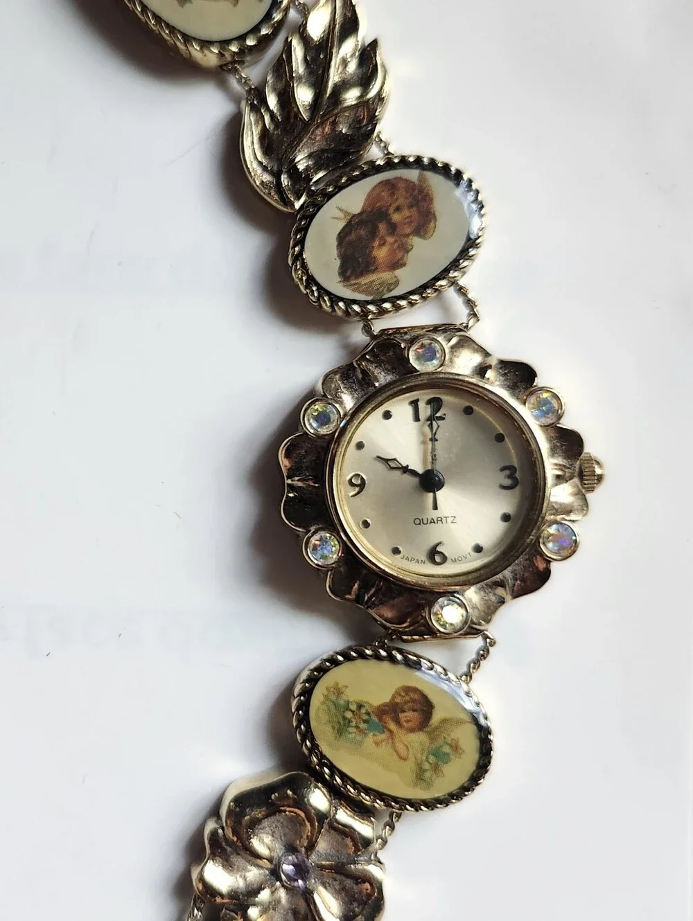 Vintage Gold Tone Floral Bracelet Watch with Cherub Medallions